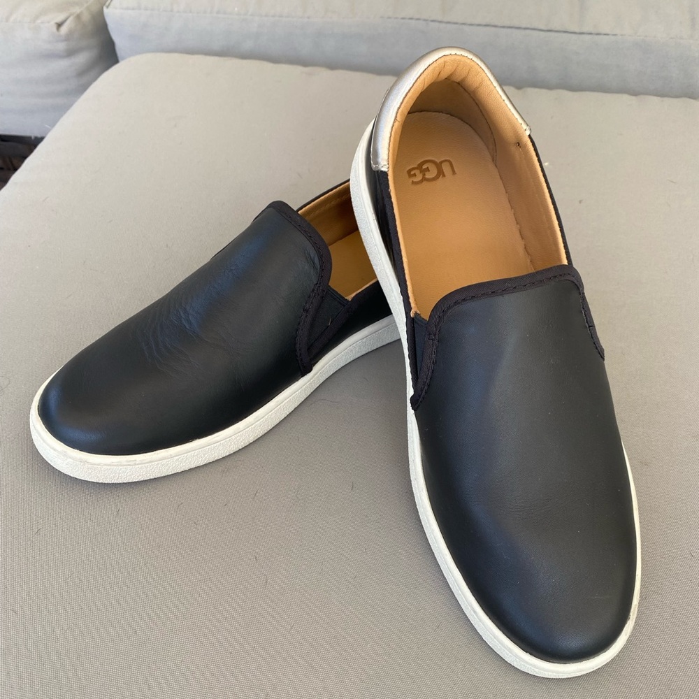 Ugg- women’s black leather slip on sneakers. Size 8.5. Very good condition.